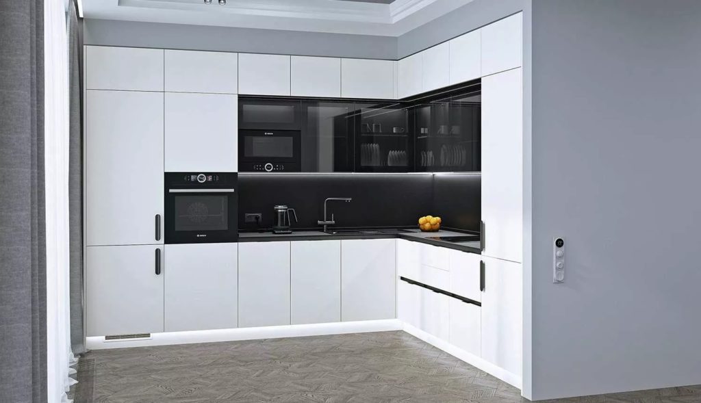 Белая кухня с серой столешницей легко впишется в современный интерьер